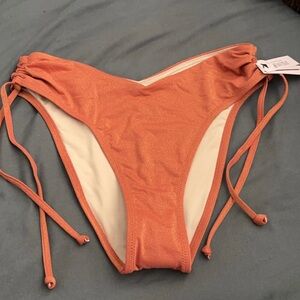 Ruched shine bikini bottom